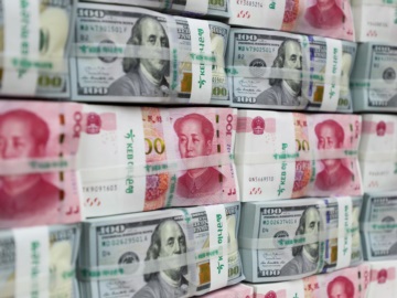 Κίνα: Με το γουάν θέλει να εκθρονίσει το δολάριο